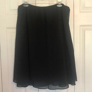 Black 🖤 Ladies skirt. Elastic waist, ruffle hem.